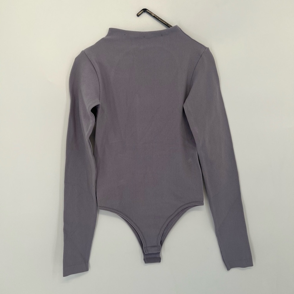 Zara Limitless Contour High Neck Long Sleeve Back Cut Out Bodysuit In Lavender